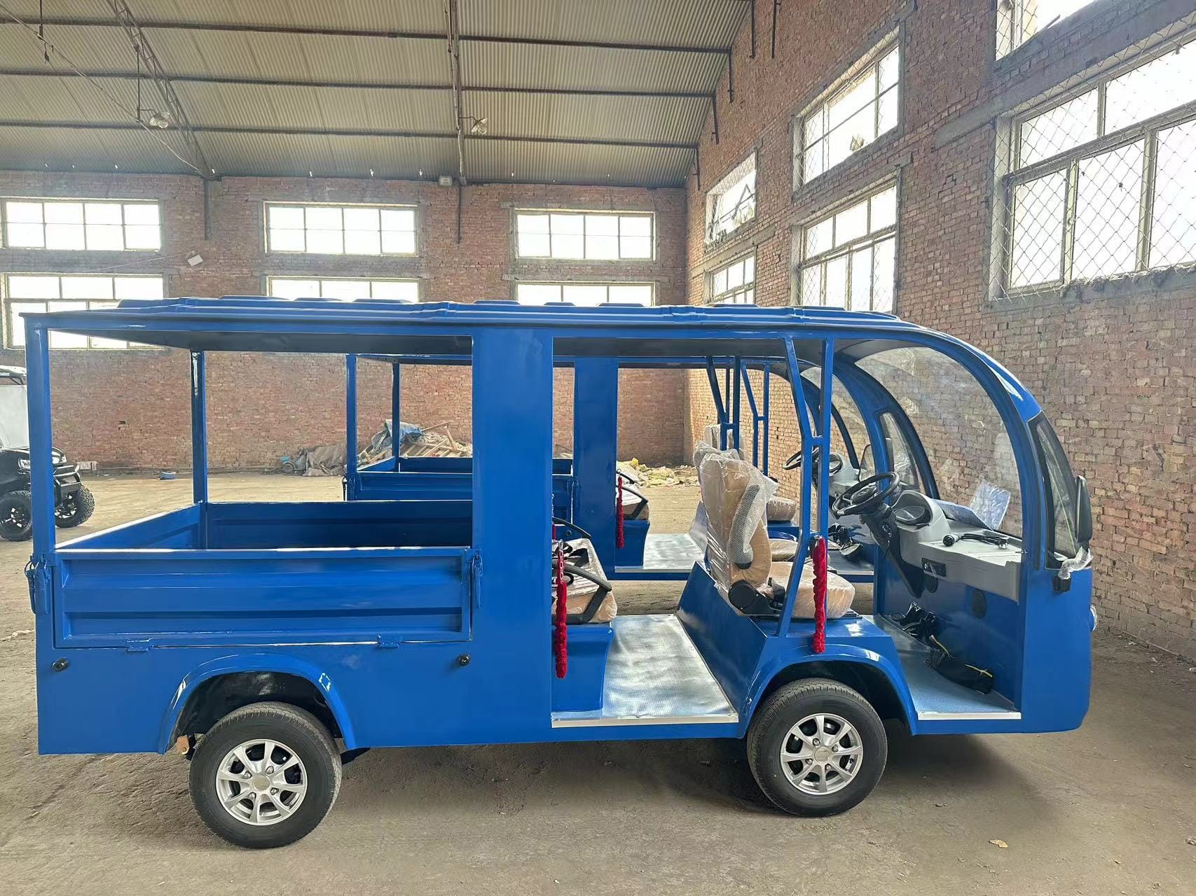 Multi-purpose electric buggy with cargo and passenger configuration for industrial applications