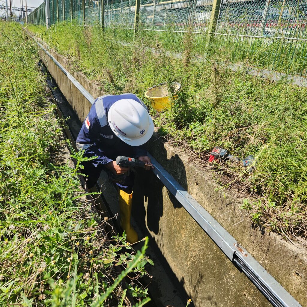 Cable laying and cable support system installation works for industrial infrastructure in Singapore.